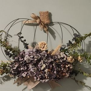 Pumpkin with dried hydrangeas
